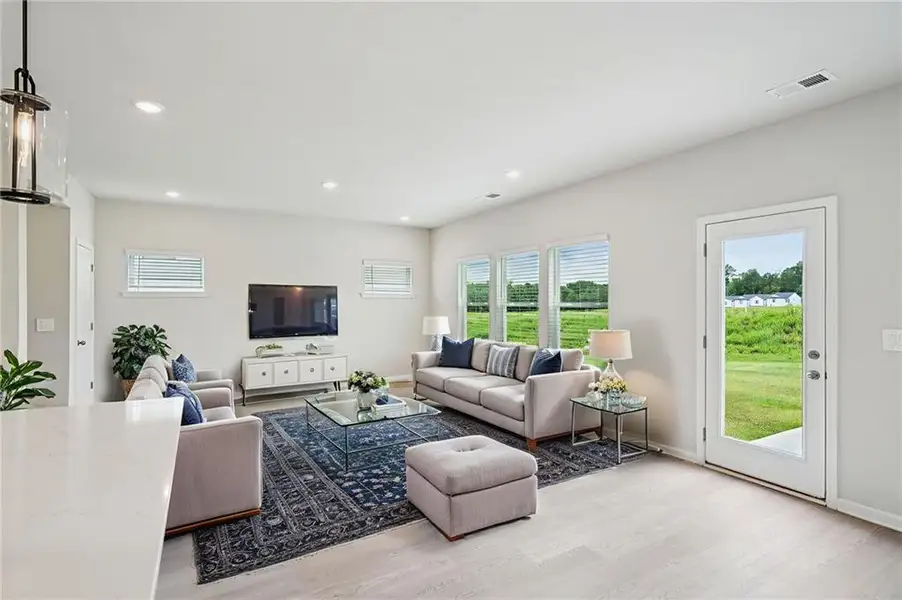 Furnished interior view inside a new home in Avalon - Reserve Series, Conyers (Image 6).
