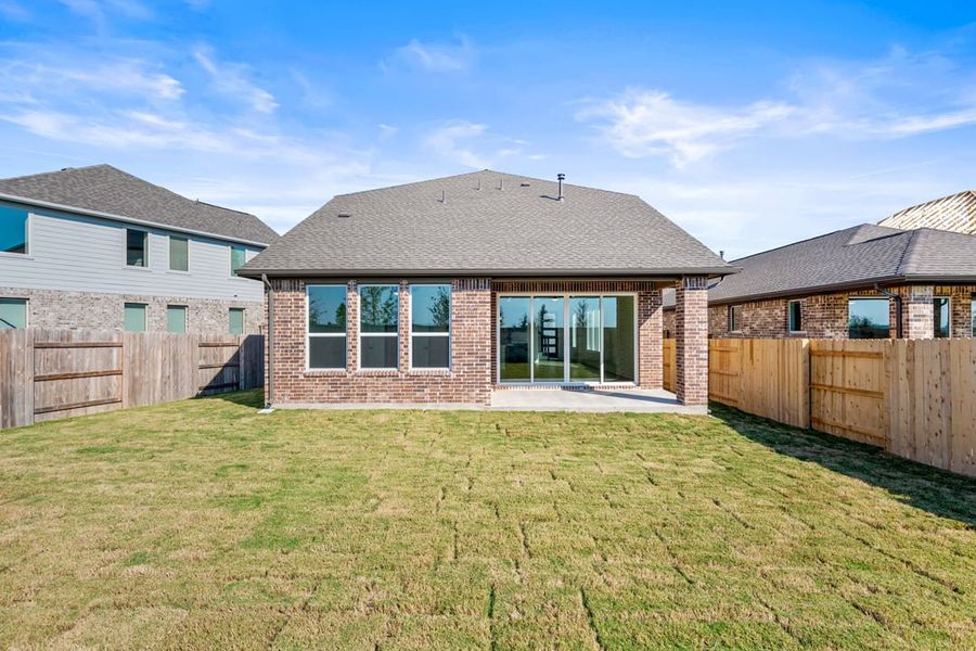 Exterior details and patio area of a home in Flora, Hutto (Image 24).