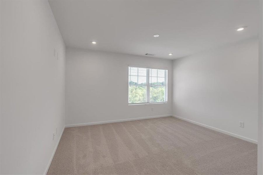 Spacious, unfurnished interior of a new home in The View at Groover's Lake, Lithia Springs (Image 23).