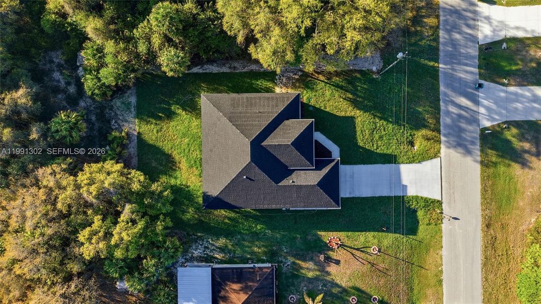 Front exterior of a new home in , Labelle, FL, highlighting curb appeal (Image 24).