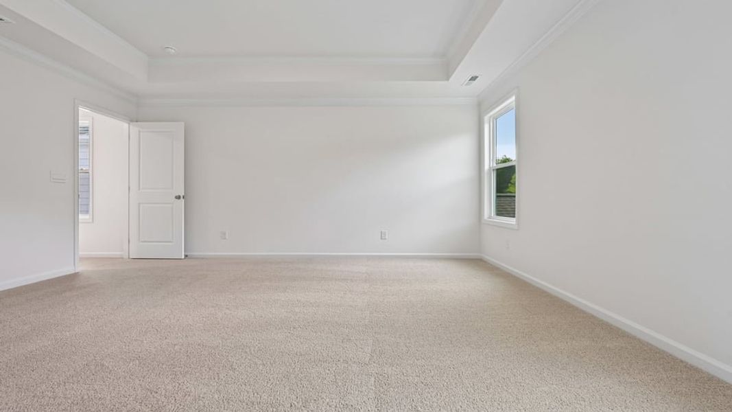 Spacious, unfurnished interior of a new home in The Estates Park, Apex (Image 32).