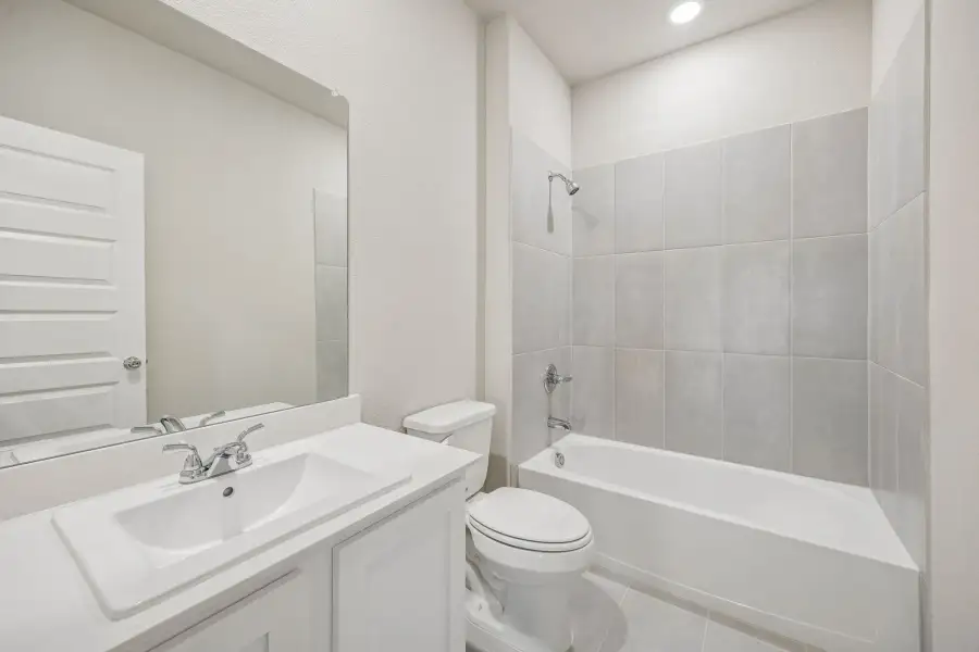 Bathroom in the Wimbledon home plan by Trophy Signature Homes – REPRESENTATIVE PHOTO Bathroom in the Wimbledon home plan by Trophy Signature Homes – REPRESENTATIVE PHOTO