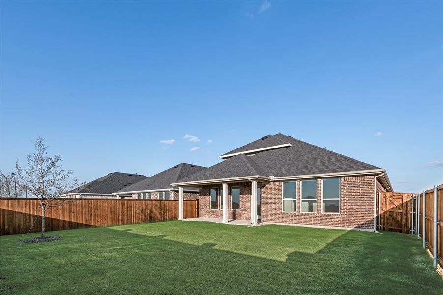Exterior details and patio area of a home in Arbors at Legacy Hills, Celina (Image 4). Exterior details and patio area of a home in Arbors at Legacy Hills, Celina (Image 4).