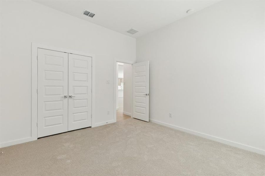 Bedroom in the Gilmour II home plan by Trophy Signature Homes – REPRESENTATIVE PHOTO Bedroom in the Gilmour II home plan by Trophy Signature Homes – REPRESENTATIVE PHOTO