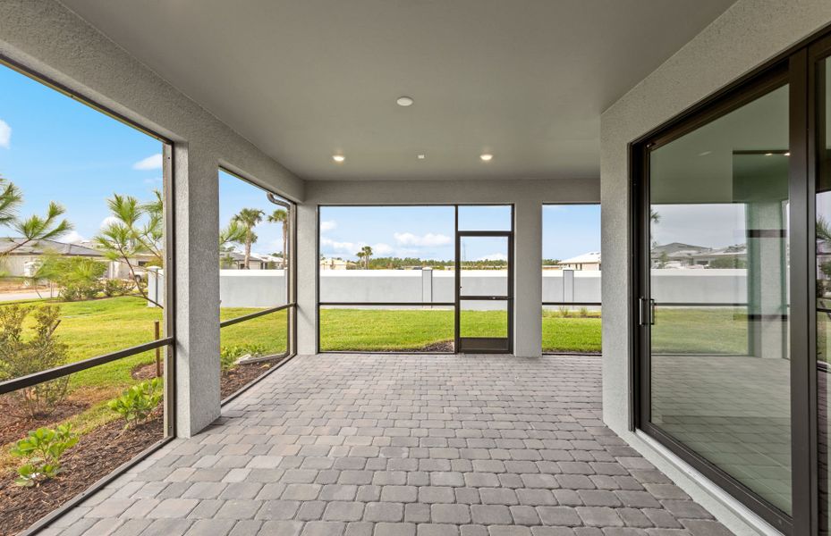 Exterior details and patio area of a home in Arbor Oaks, North Port (Image 3).