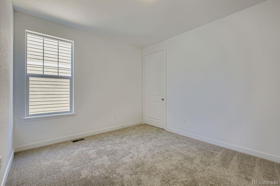 Spacious, unfurnished interior of a new home in Riano Ridge, Loveland (Image 18).