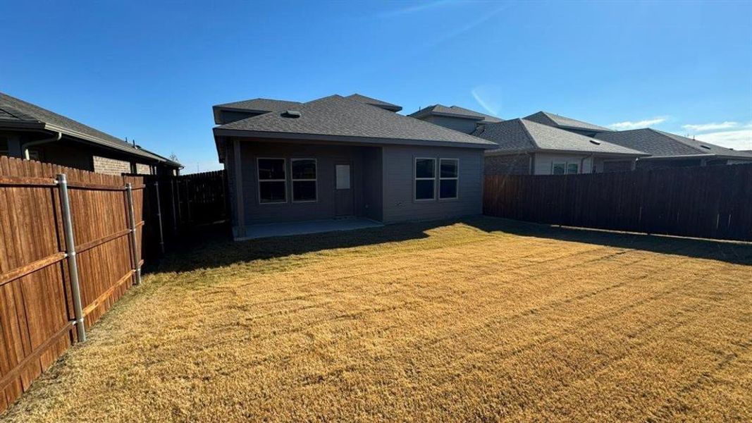 Exterior details and patio area of a home in Monarch at the Meadows, Ponder (Image 3).