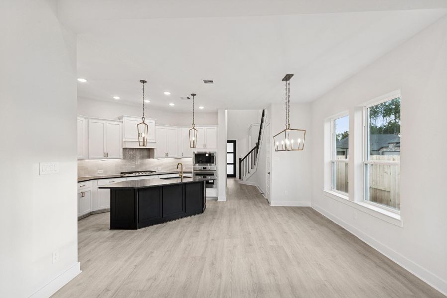 Furnished interior view inside a new home in The Highlands - Grove Collection, Porter (Image 11).
