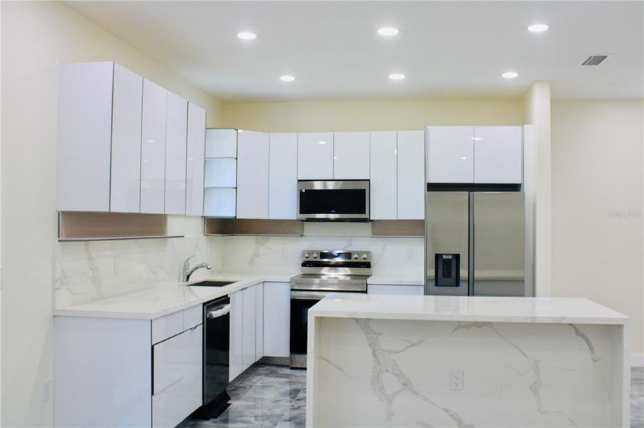 Furnished interior view inside a new home in , Port Charlotte (Image 11).