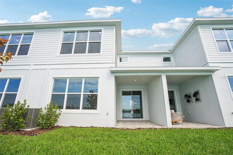 Front exterior of a new home in Isla Mirada, San Antonio, FL, highlighting curb appeal (Image 22).
