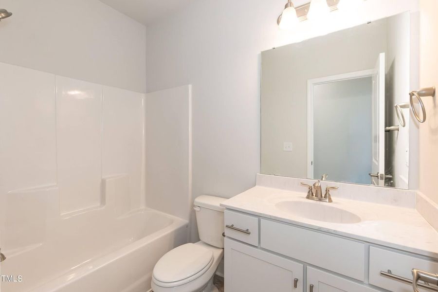 Representative furnished interior of a home built from the 2913 by Adams Homes in Hidden Pines, Cameron (Image 8).