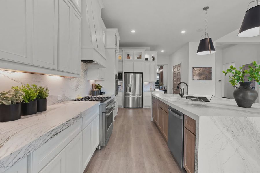 Representative furnished interior of a home built from the Savara by Chesmar Homes in Potranco Oaks 100's, Castroville (Image 7).
