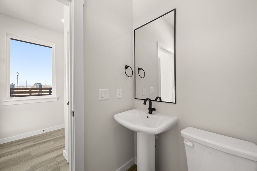 Furnished interior view inside a new home in Wildridge, Oak Point (Image 11).