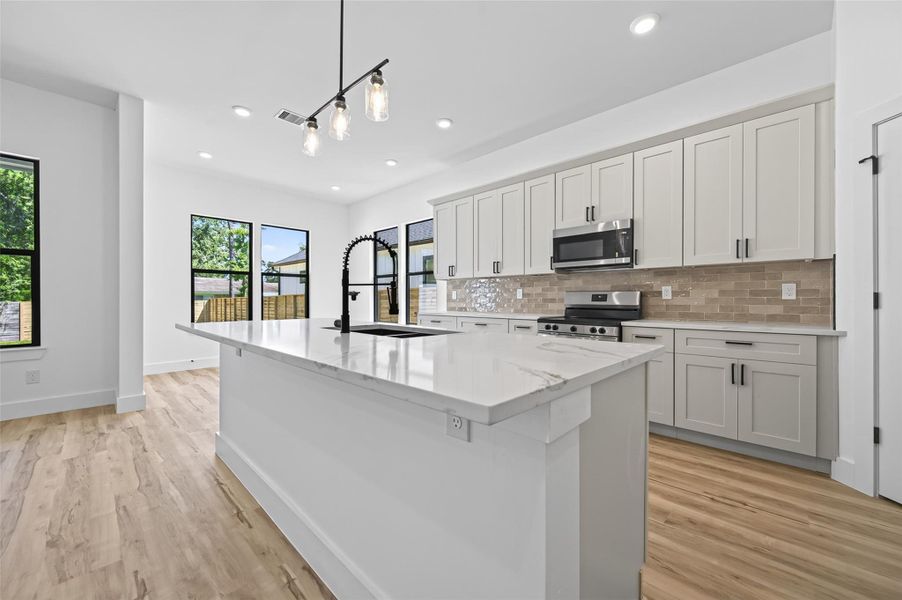 Furnished interior view inside a new home in , Conroe (Image 5).