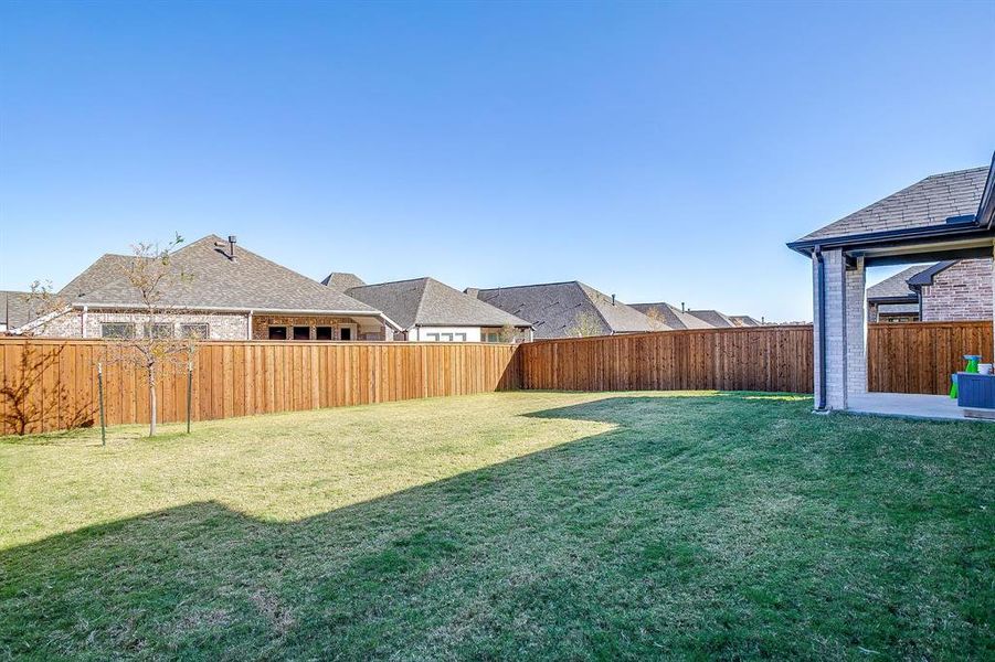 Exterior details and patio area of a home in Ventana, Fort Worth (Image 23).