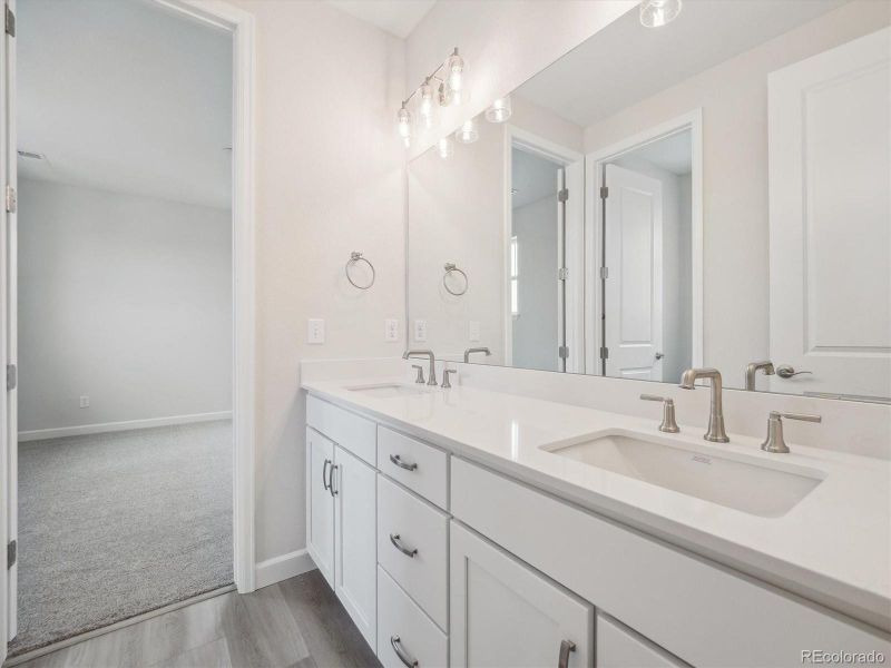 Furnished interior view inside a new home in Vista Pines at Crystal Valley, Castle Rock (Image 10).