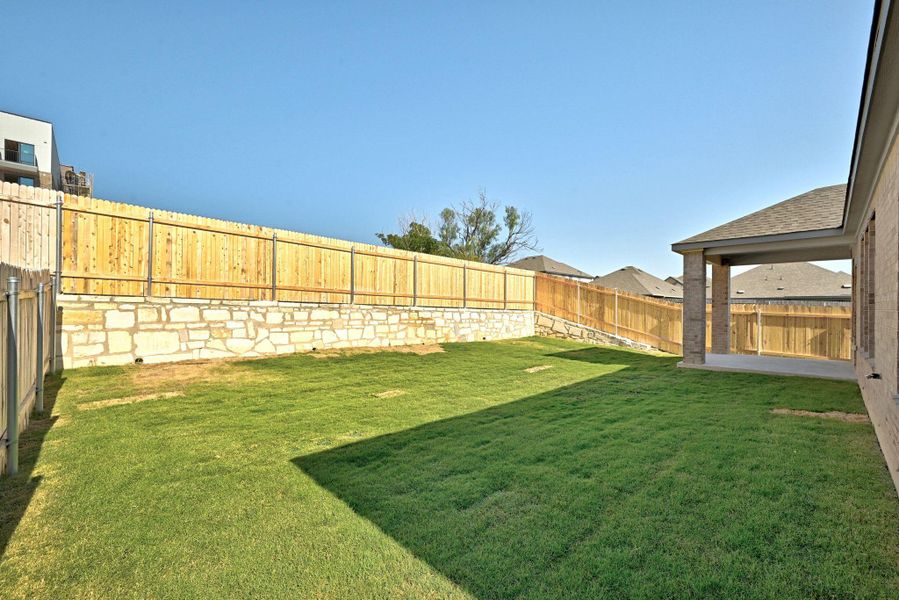 Exterior details and patio area of a home in McKinney Crossing, Austin (Image 23). Exterior details and patio area of a home in McKinney Crossing, Austin (Image 23).