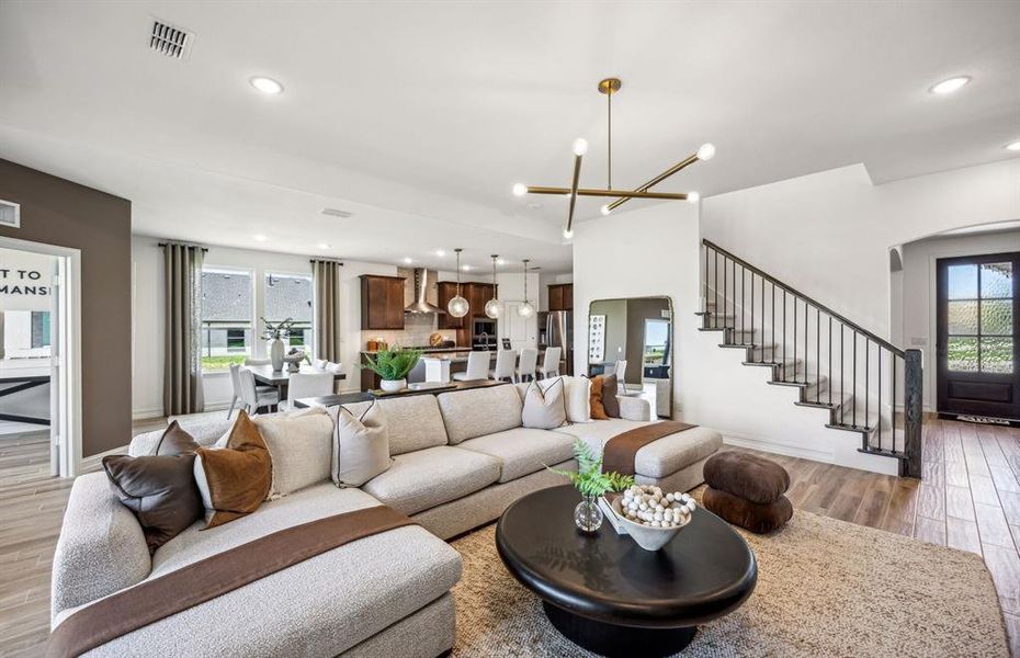 *actual home, furniture not included - Gathering room with view of main living areas