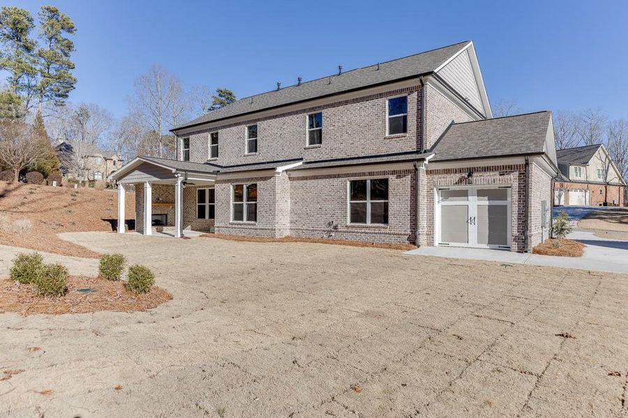 Front exterior of a new home in , Bishop, GA, highlighting curb appeal (Image 2). Front exterior of a new home in , Bishop, GA, highlighting curb appeal (Image 2).