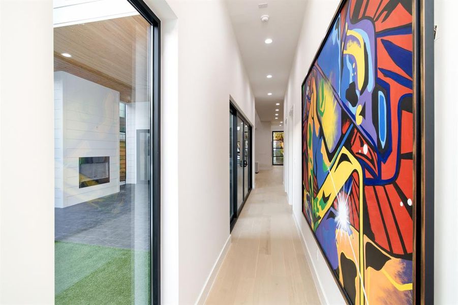 Corridor featuring light hardwood / wood-style flooring