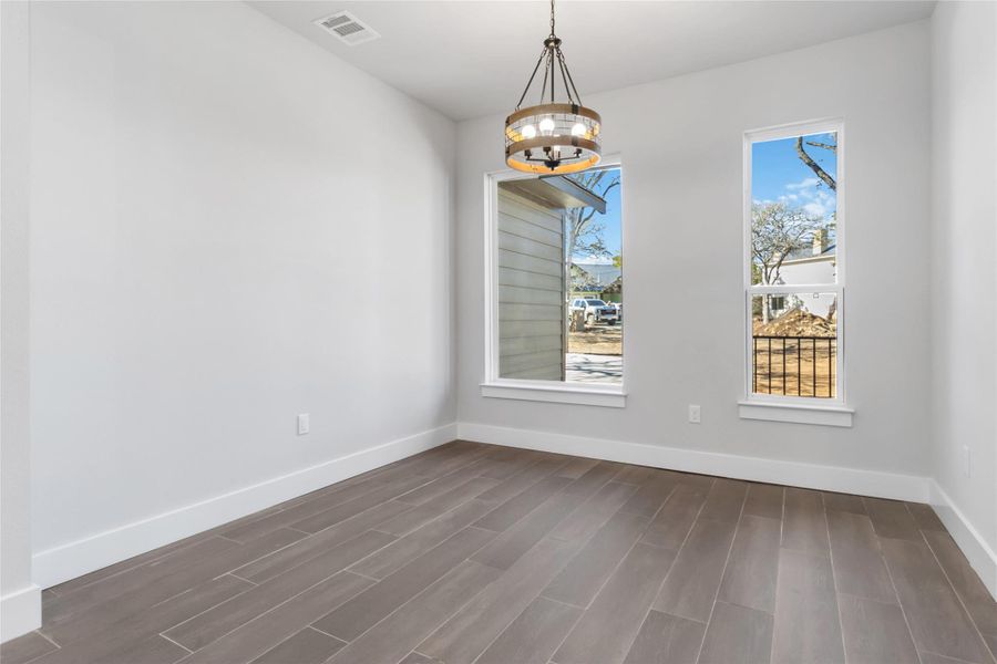 Dedicated dining room and a notable chandelier