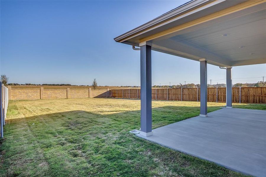 Exterior details and patio area of a home in Sierra Vista at Kelly Ranch, Aledo (Image 16).