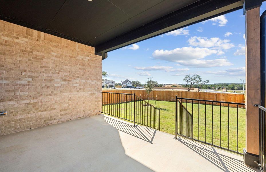 Exterior details and patio area of a home in Woodside, Georgetown (Image 15).