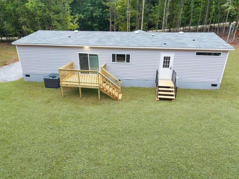 Front exterior of a new home in , Eatonton, GA, highlighting curb appeal (Image 21).