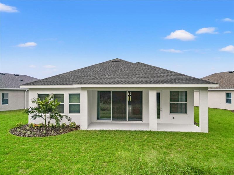 Exterior details and patio area of a home in , Parrish (Image 3).