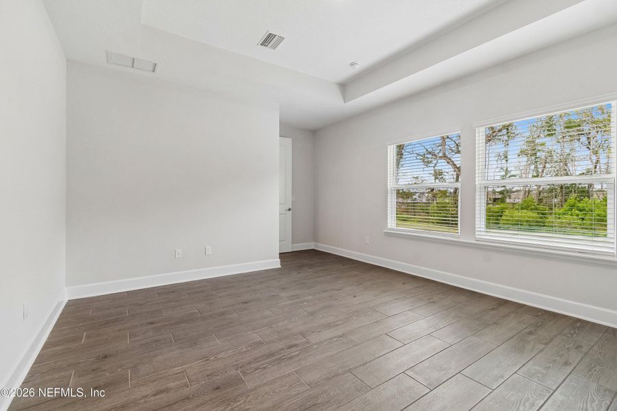 Spacious, unfurnished interior of a new home in Tributary 50', Yulee (Image 19). Spacious, unfurnished interior of a new home in Tributary 50', Yulee (Image 19).