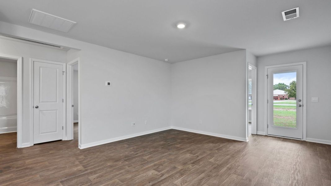 Representative unfurnished interior of a home built from the DOWNING by D.R. Horton in Saltgrass Landing, Winnabow (Image 12).