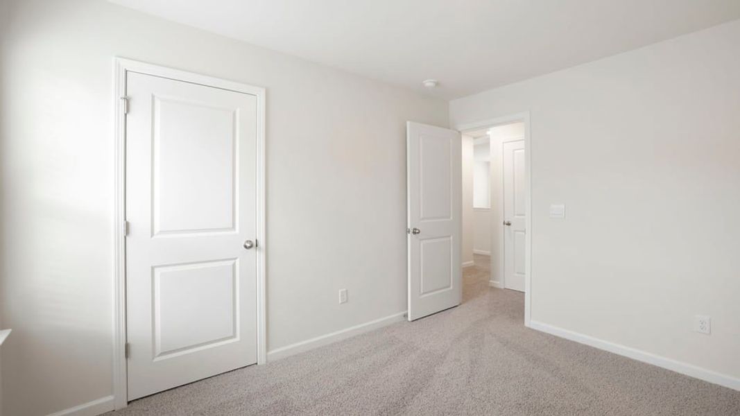 Spacious, unfurnished interior of a new home in Bentley Park, Greenwood (Image 30). Spacious, unfurnished interior of a new home in Bentley Park, Greenwood (Image 30).
