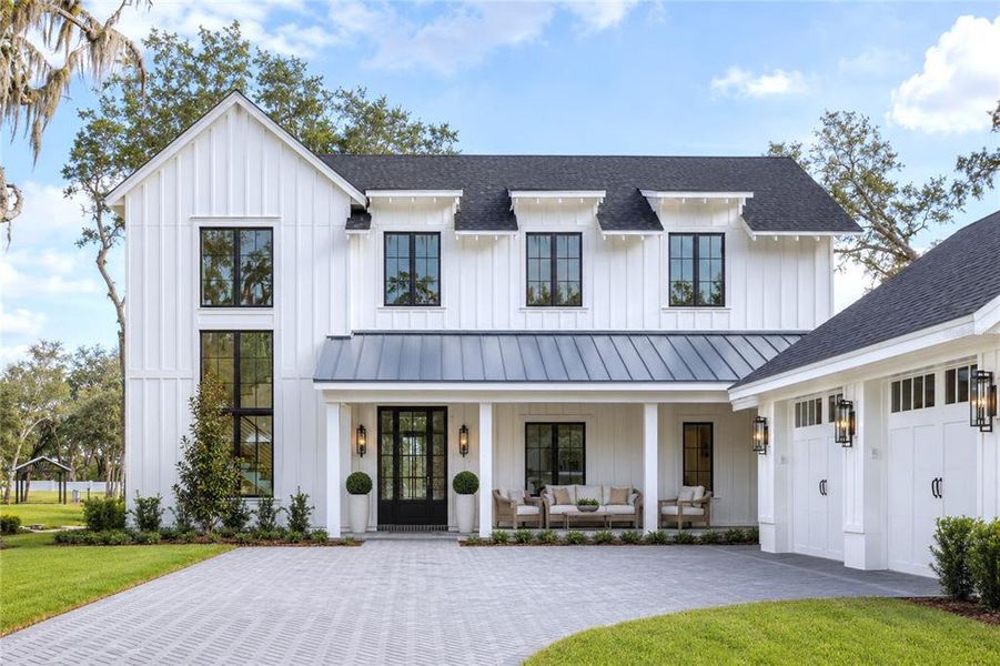 Front exterior of a new home in , Winter Garden, FL, highlighting curb appeal (Image 2). Front exterior of a new home in , Winter Garden, FL, highlighting curb appeal (Image 2).