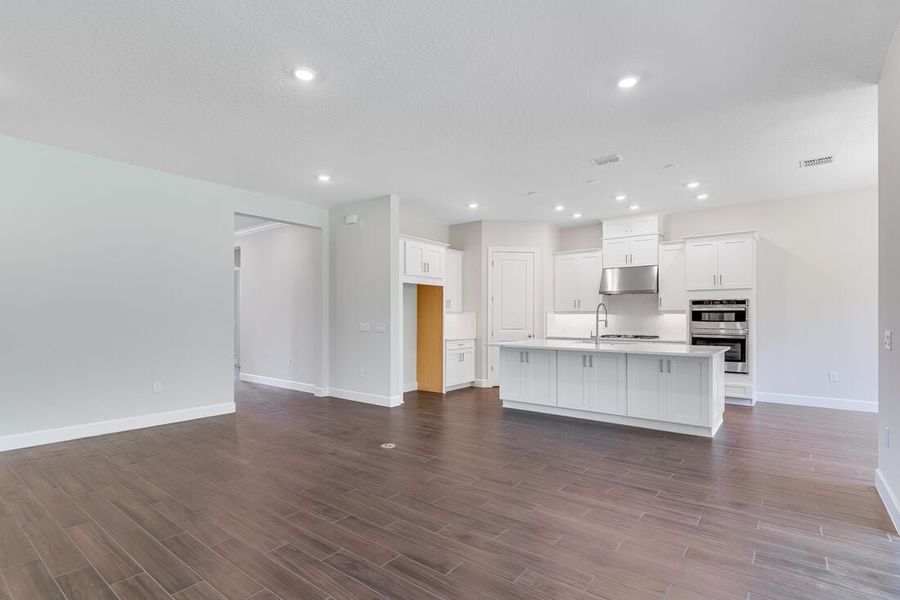 Representative unfurnished interior of a home built from the Letizia by Taylor Morrison in Esplanade at Center Lake Ranch, St. Cloud (Image 23).