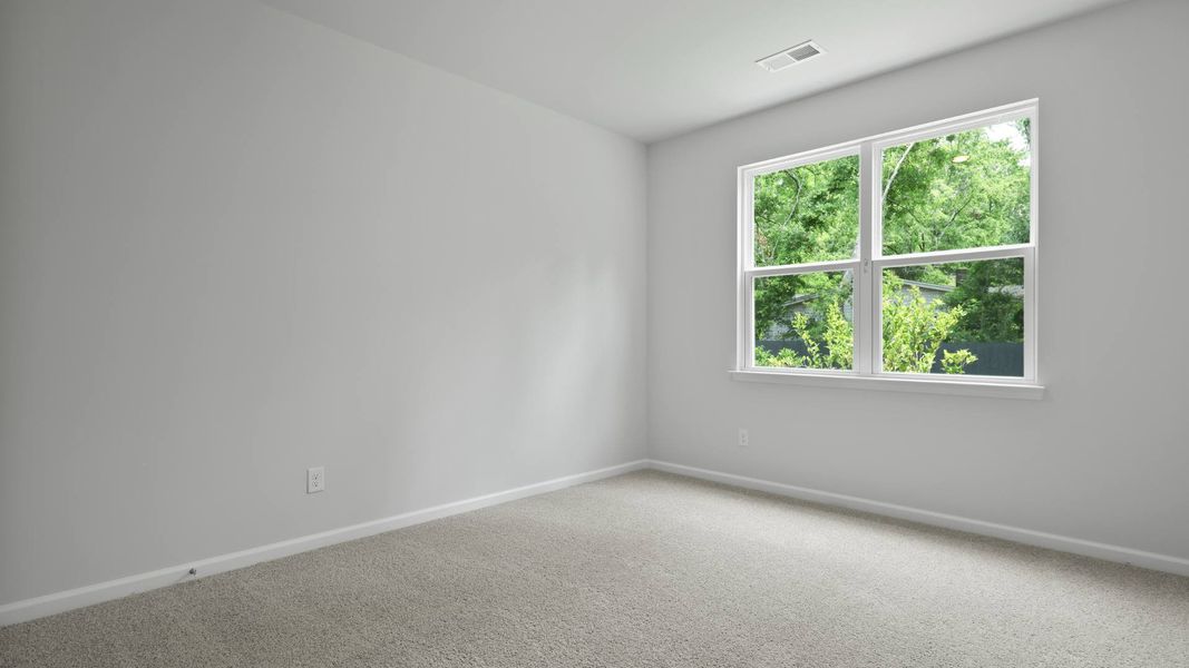 Representative unfurnished interior of a home built from the FORRESTER by D.R. Horton in Founders Corner, Summerville (Image 13).