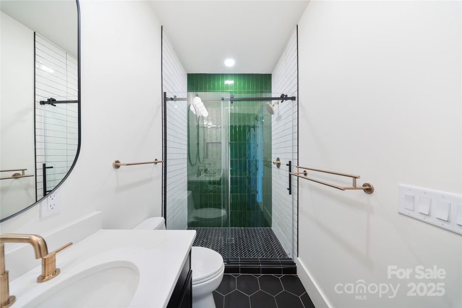 Sliding glass shower doors & marble shower floor Sliding glass shower doors & marble shower floor