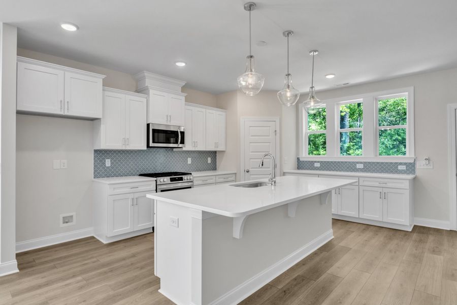 Representative furnished interior of a home built from the The Highland by RobuckHomes in Kennebec Crossing, Angier (Image 15). Representative furnished interior of a home built from the The Highland by RobuckHomes in Kennebec Crossing, Angier (Image 15).