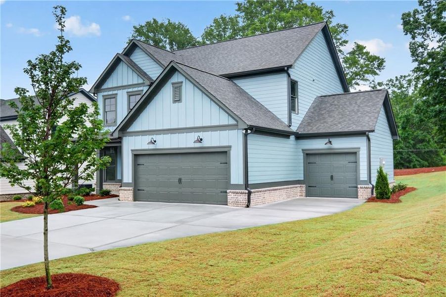 Front exterior of a new home in , Winder, GA, highlighting curb appeal (Image 17).