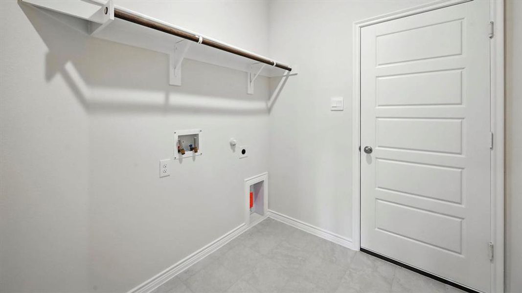Laundry area featuring washer hookup, electric dryer hookup, and gas dryer hookup