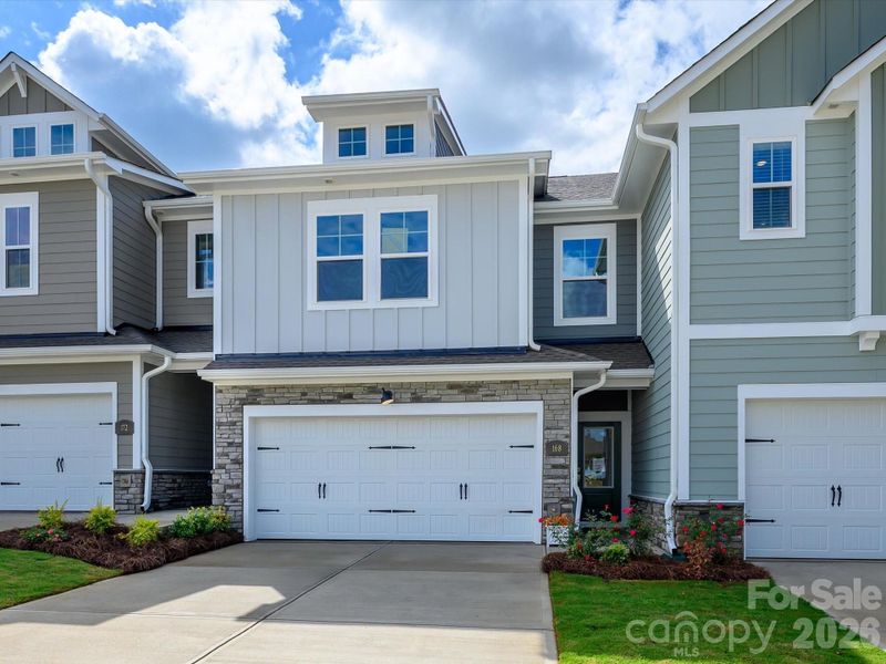 Front exterior of a new home in Westview Towns, Waxhaw, NC, highlighting curb appeal (Image 1). Front exterior of a new home in Westview Towns, Waxhaw, NC, highlighting curb appeal (Image 1).