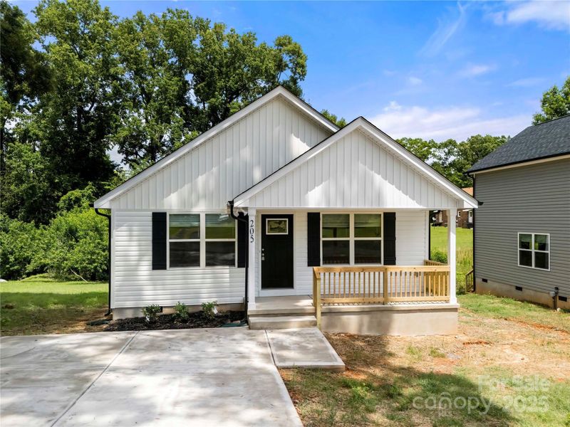 Front exterior of a new home in , Albemarle, NC, highlighting curb appeal (Image 2).