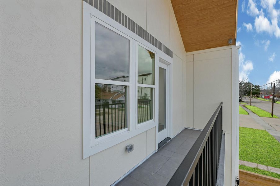 Exterior details and patio area of a home in , Houston (Image 4).