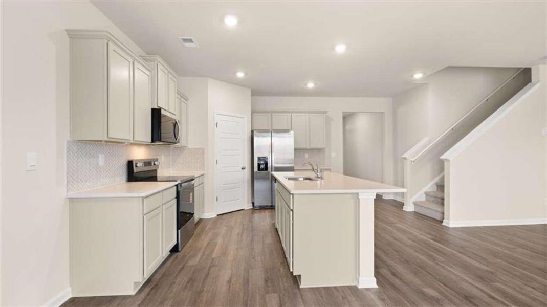 Furnished interior view inside a new home in The Preserve at Agricultural Village, Perry (Image 3).