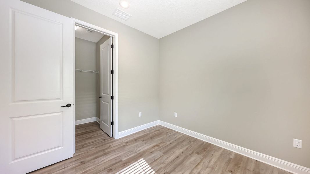 Spacious, unfurnished interior of a new home in Palm Grove Real Estate and Homes for Sale in Lakewood Ranch, FL - Neal Communities, Lakewood Ranch (Image 39). Spacious, unfurnished interior of a new home in Palm Grove Real Estate and Homes for Sale in Lakewood Ranch, FL - Neal Communities, Lakewood Ranch (Image 39).