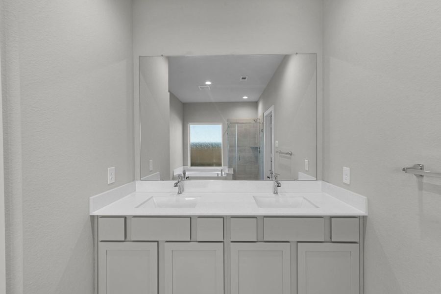 Furnished interior view inside a new home in Sunterra Lakes, Brookshire (Image 6).