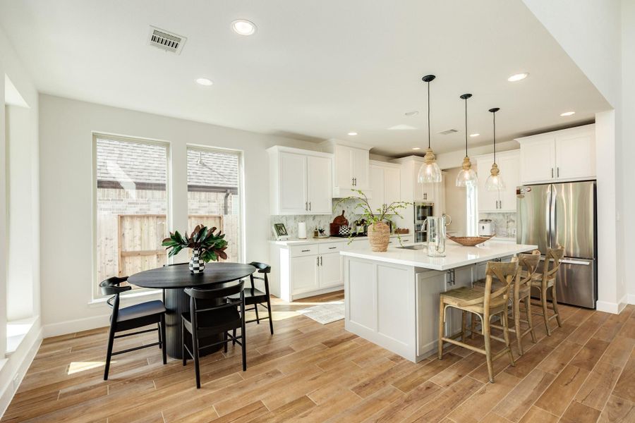This is the perfect breakfast nook overlooking the covered patio and backyard—a great place to sip on your morning beverage while enjoying the morning sun This is the perfect breakfast nook overlooking the covered patio and backyard—a great place to sip on your morning beverage while enjoying the morning sun