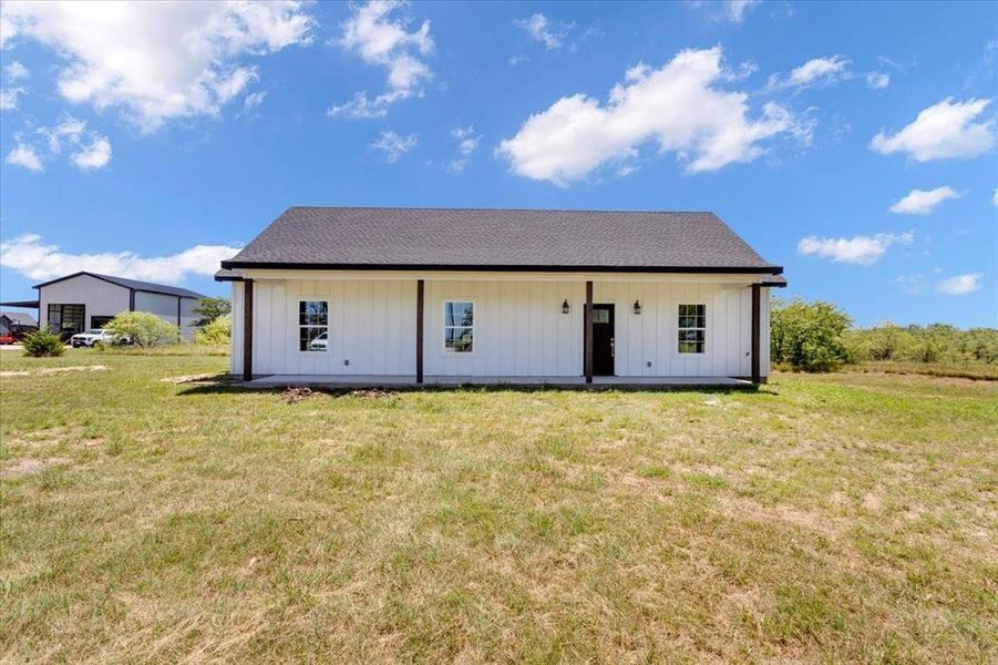 Front exterior of a new home in , Whitesboro, TX, highlighting curb appeal (Image 14).