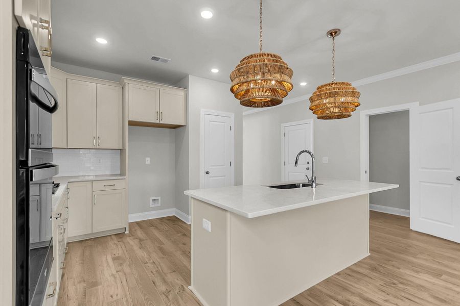 Furnished interior view inside a new home in Tidewater at Lakes of Cane Bay, Summerville (Image 7).