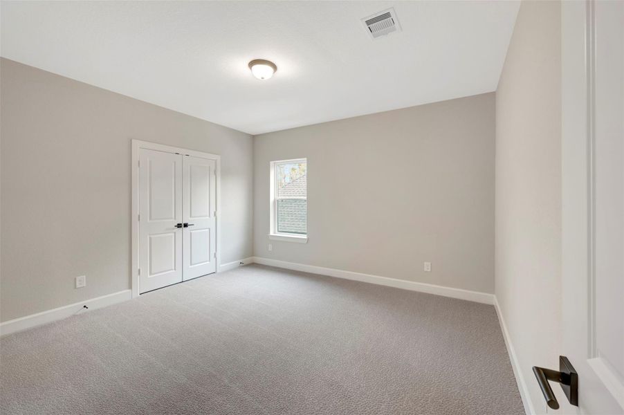 Spacious, unfurnished interior of a new home in The Woodlands Hills 70’, Willis (Image 20).