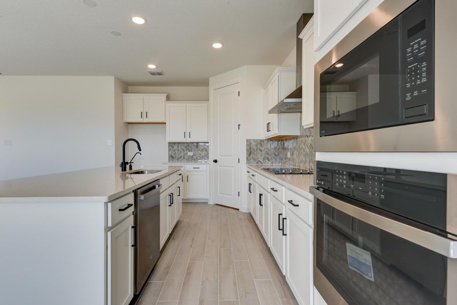 Representative furnished interior of a home built from the Leander by Ashton Woods in The Heights at Saddlebrook Ranch 60's, Schertz (Image 4). Representative furnished interior of a home built from the Leander by Ashton Woods in The Heights at Saddlebrook Ranch 60's, Schertz (Image 4).